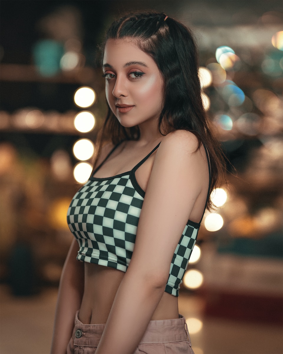 woman in black and white polka dot bikini top