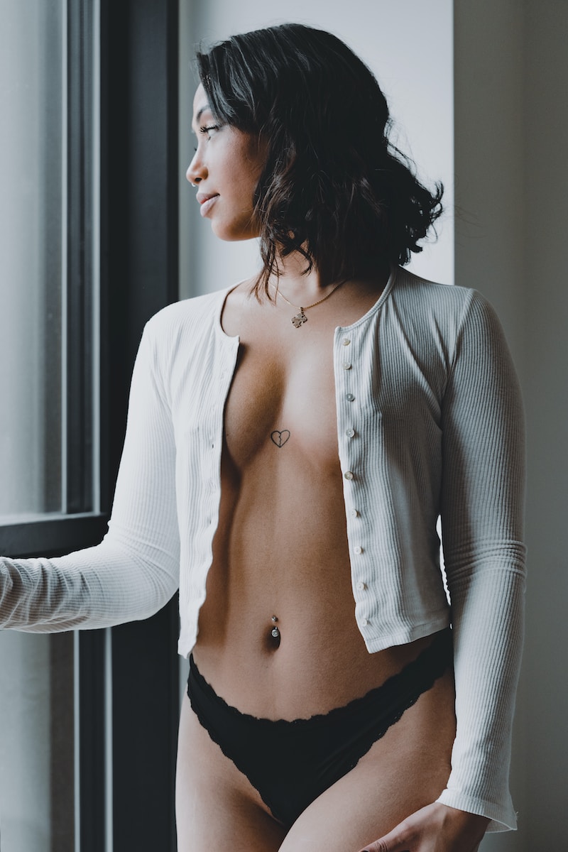 woman in white cardigan and black panty